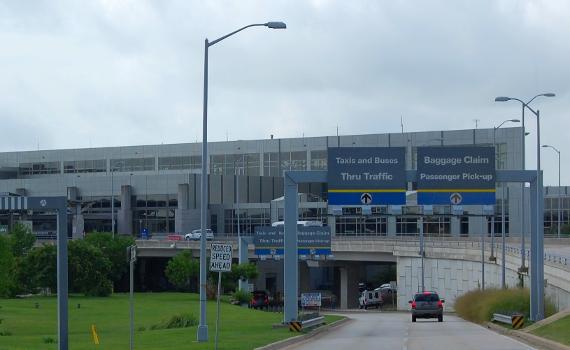 Approaching Austin Bergstrom International Airport : The upper-level roadway is for departures, while the lower-level roadway is for arrivals.