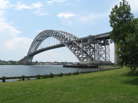 Looking southwest at Bayonne Bridge from Collins Park in Bayonne on a mostly cloudy afternoon