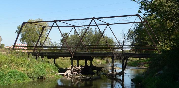 Clear Creek Bridge : Clear Creek Bridge; seen from the west (upstream). The bridge is located in Butler County, Nebraska, where county road BC crosses the creek, northwest of Bellwood, Nebraska. The bridge was built in 1891, and is listed in the National Register of Historic Places.