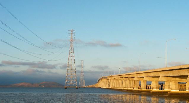 The power towers and the Dumbarton Bridge at sundown.:Photo is taken from the north side of the bridge, looking east. Dumbarton Bridge