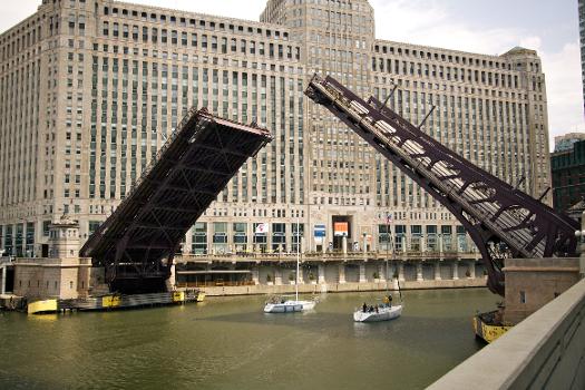 The Franklin Street Bridge, over the Chicago River, in Chicago, Illinois, raised to allow two sailboats to pass.