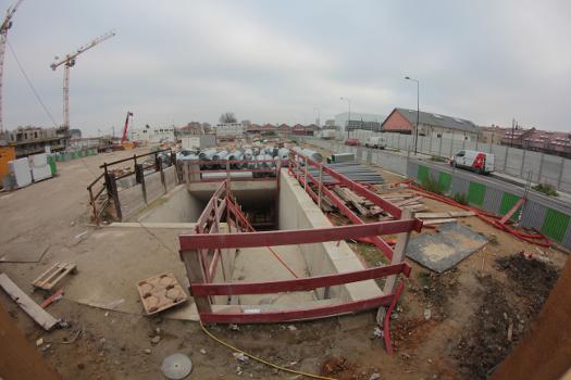 The metro station under construction Front Populaire (previously known as Proudhon-Gardinoux) of Parisian metro line 12:Located on the border of the communes of Saint-Denis and Aubervilliers