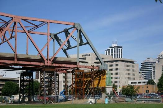 Peoria end of the Murray Baker Bridge during reconstruction:In background at end of bridge, across top from center to right: Caterpillar Inc. World headquarters; Twin Towers; Becker Building; Commerce Bank (old First National Bank of Peoria); Caterpillar building (old Security Savings).