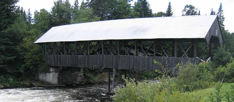 The Pittsburg-Clarksville (New Hampshire) covered bridge is a Paddleford truss bridge with added arches over the River. Currently closed.