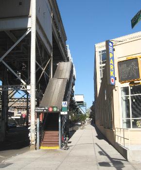 Looking northeast at southern street stair of Intervale Avenue (IRT White Plains Road Line) on a sunny early afternoon