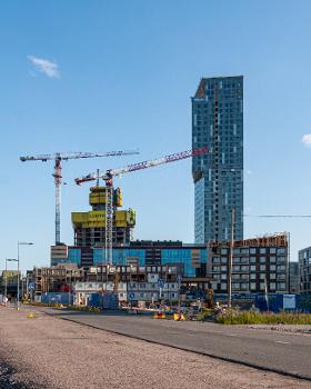 Majakka (mostly finished) and Loisto (under construction) apartment buildings in Kalasatama, Helsinki, Finland
