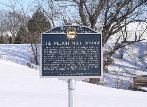 Neligh Mill Bridge:Historical marker at Neligh Mill Bridge over the Elkhorn River in Neligh, Nebraska; seen from the southwest (upstream). The pin-connected Pratt through truss bridge was constructed in 1910; it is listed in the National Register of Historic Places.