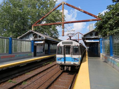 An outbound train at Beachmont station