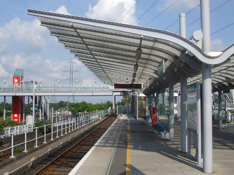 Prince Regent DLR station looking east:The now disused former North London Line single track towards North Woolwich can be glimpsed descending into tunnel to the left