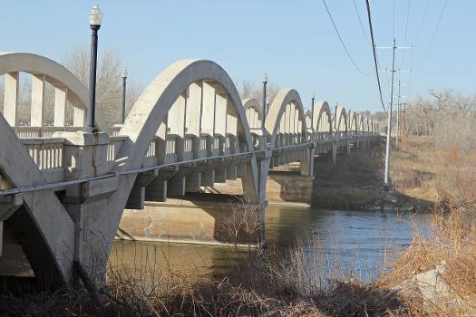 The Rainbow Arch Bridge, located in Fort Morgan, Colorado:The bridge, now closed to vehicles, goes over the South Platte River. The structure is listed on the National Register of Historic Places. The bridge is located just north of Fort Morgan on Colorado State Highway 52.