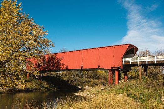 The Roseman Covered Bridge in Winterset, Madison County, Iowa : It was built in 1883 and still stands in ist original location over the Middle River. The Roseman was featured prominently in the novel, movie and musical "The Bridges of Madison County".