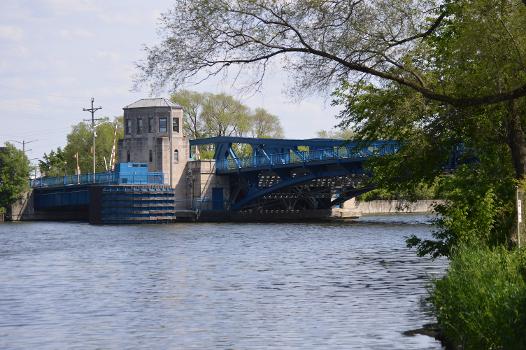 The eastern half, and operator's tower, of the Ruby Street Bridge, a 1935 double-leaf bascule bridge in Joliet, Illinois. Viewed from the northwest