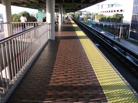 Morning view of platform and southbound track at South Miami Metrorail station
