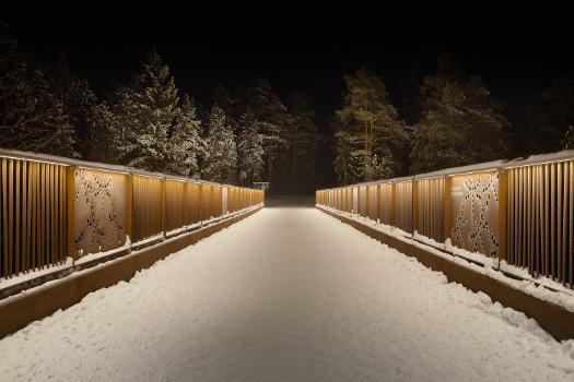 Sudentassu bridge connecting Kuusijärvi recreational center to the forests of Sipoonkorpi in Vantaa, Finland : The bridge crosses Vanha Porvoontie road and Myyraksenoja brook.