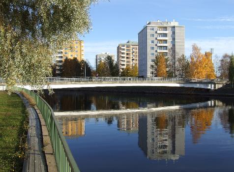 Apartment buildings in Toivoniemi island in Oulu with the Alakanava pedestrian and bicycle bridge in the foreground