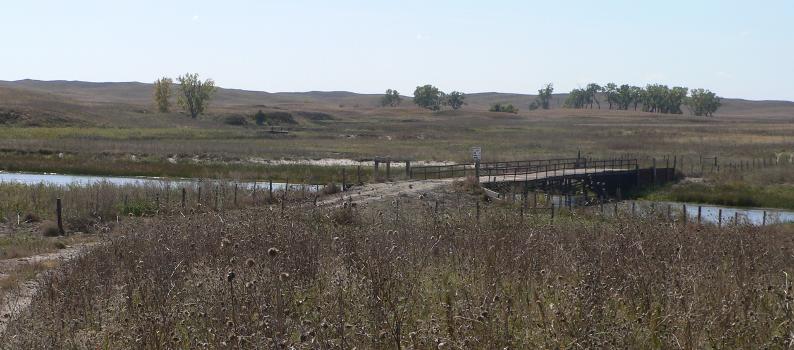 Twin Bridge:Twin Bridge, carrying a minimm-maintenance county road across the North Loup River northwest (upstream) of Brownlee, Nebraska; seen from the north bank.