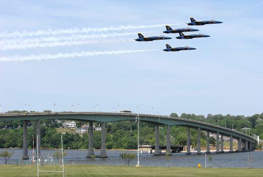 The U. S. Navy's Flight Demonstration Squadron, also known as the Blue Angels, display precision flight maneuvers over the Naval Academy Bridge : Their performance was one of a series of events leading up the graduation and commissioning of the Naval Academy Class of 2007. Other special events included performances from the Marine Barracks Washington Silent Drill Platoon and the U.S. Naval Academy Pipes and Drums. U.S. Navy photo by Gin Kai (RELEASED)
