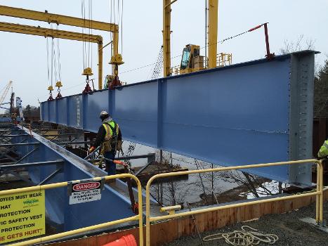 John Greenleaf Whittier Bridge:Crews use the gantry crane to erect steel beams on the Newburyport approach spans of the new Whittier Bridge