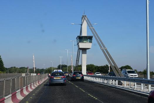The Myton Bridge in Kingston upon Hull, viewed from the eastbound carriageway : New barriers and LED lighting have been installed, while work is nearly complete to convert the bridge from two to three lanes.
N.B. The dust specs on the photographs are not on the photograph itself, but are the byproducts of dirt on my car windshield.