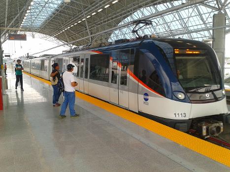 A 19 Alstom Metropolis train owned by the Panama Metro arriving at Pueblo Nuevo station