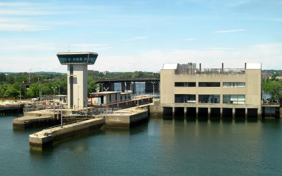 The Amelia Earhart Dam viewed from a passing MBTA train