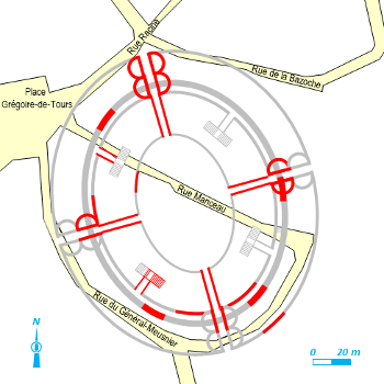 Vestiges de l'amphithéâtre (en rouge) reportés sur son tracé supposé (en noir) et dans le plan de la ville moderne (en gris)