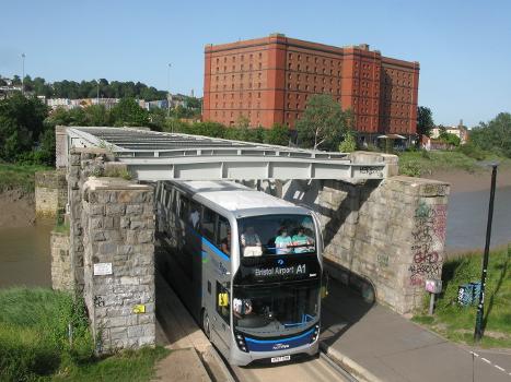 Ashton Avenue Bridge, Bristol:A Bristol Airport Flyer (First West of England's 36834, an Enviro400MMC registered YP67XDM) emerges from the Ashton Avenue Bridge as it heads out of Bristol.