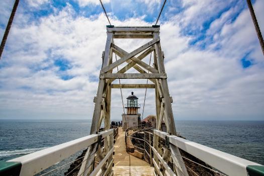 Bonita Point lighthouse seen through the suspension bridge