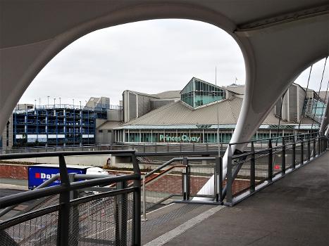 Murdoch's Connection, Kingston upon Hull : A spectacular footbridge to provide a better and safer pathway between the city centre and the waterfront and Fruit Market regeneration sites was opened to the general public for the first time on 1 March 2021. It was announced in September 2020 that the bridge was to be named 'Murdoch's Connection' after Dr Mary Murdoch, the city's first female G.P. Further information in Hull News: .
Looking through the bridge structure towards Prince's Quay car park and shopping centre.