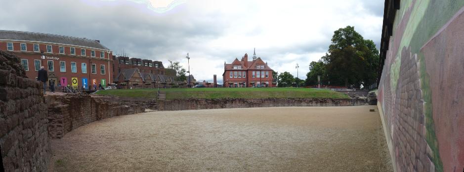 Remains of Chester Roman Amphitheatre : This view is a circa 90° panorama of the north side viewed from the western edge of the excavated arena floor.