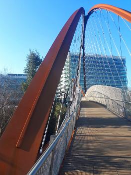Chiswick Park Footbridge connecting the business park with Chiswick Park Station in London, UK