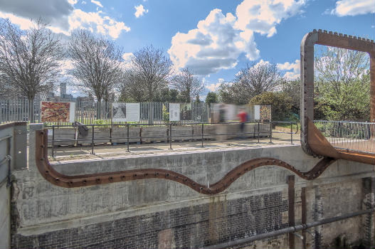 Part of the Cody Dock Rolling Bridge designed by Thomas Randall-Page : The square cog design, rolling on catenary curve tracks - together with a balanced centre of gravity - enables the bridge to be rolled between higher and lower positions with minimum effort.