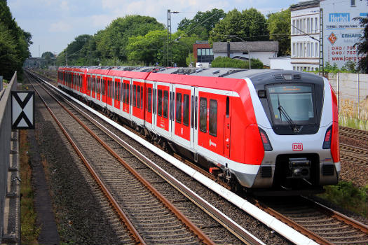 A brand-new DB 490 unit operating a Hamburg S-Bahn train, taken near a KFC on Stader Str., Hamburg-Harburg.