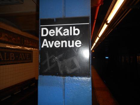 DeKalb Avenue Subway Station (Canarsie Line) : Standard contemporary Helvetica sign on one of the pillars at the DeKalb Avenue (BMT Canarsie Line). The station also has plenty of pre-MTA mosaics from the BMT days, of course.