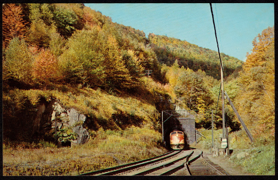 A 1950s postcard of an eastbound diesel locomotive emerging from the Hoosac Tunnel