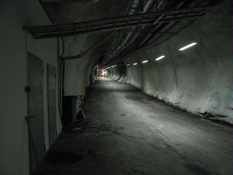 The entrance tunnel to the Svalbard Global Seed Vault : In the far end is the entrance door. To the left is the "office" section. Behind photographer is the intermediate room before the three seed vaults.