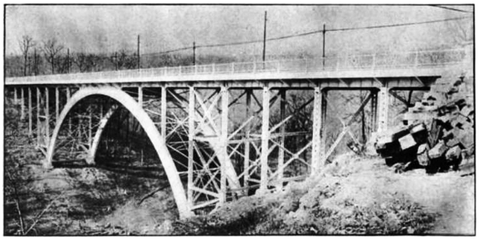 The original Fern Hollow Bridge in Pittsburgh, completed in 1901 and demolished in 1972: This carried Forbes Avenue over the west branch of Nine-Mile run.