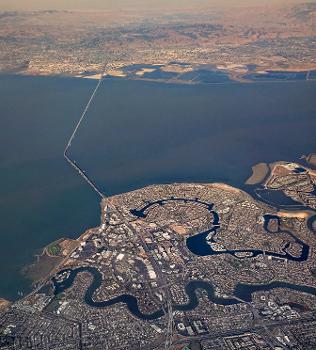 Aerial view of Foster City (foreground and center) and the San Mateo Bridge