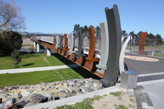 He Ara Kotahi Bridge, a pedestrian and cycle bridge across the Manawatu River in Palmerston North, New Zealand. Side view.