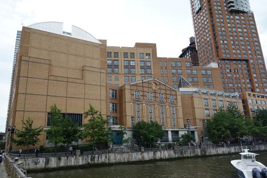 Stuyvesant High School : Looking south at the rear face of Stuyvesant High School and the Battery Park City skyline at the south end of Hudson River Park, on the west side of West Street at North Moore Street north of Chambers Street in Tribeca, Lower Manhattan.