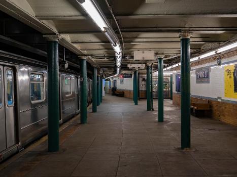 IRT Lexington Avenue Line's Spring Street station:A view of the original area of the northbound platform at the IRT Lexington Avenue Line's Spring Street station. An R62A 6 train has just closed its doors, ready to depart.