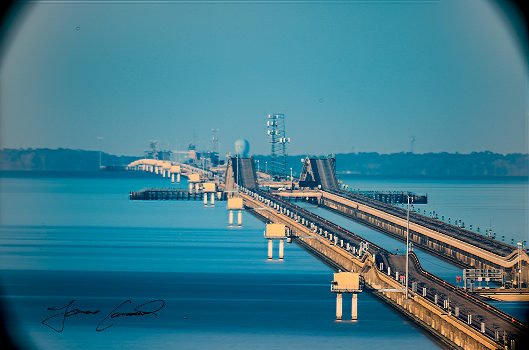 The Lake Pontchartrain Causeway seen curving over the horizon:Taken from the 16th floor of Three Lakeway Center with a Sony a7rii attached to a Celestron Nexstar Evolution 8" Schmidt Cassegrain Telescope. (19 image median stack)