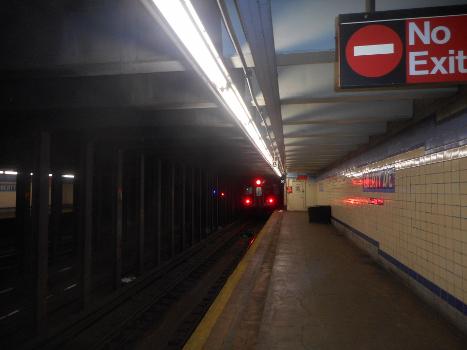 A train leaves the Euclid Avenue-bound platform of the Liberty Avenue Subway station on the IND Fulton Street Line : Located in the East New York section of Brooklyn, New York City. After that station this train will head to the Pitkin Yard, but commuters can still transfer to the train, and either go to Ozone Park-Lefferts Boulevard Elevated Railway station, or one of the two termini in the Rockaways; Rockaway Park–Beach 116th Street (IND Rockaway Line) or Far Rockaway–Mott Avenue (IND Rockaway Line).