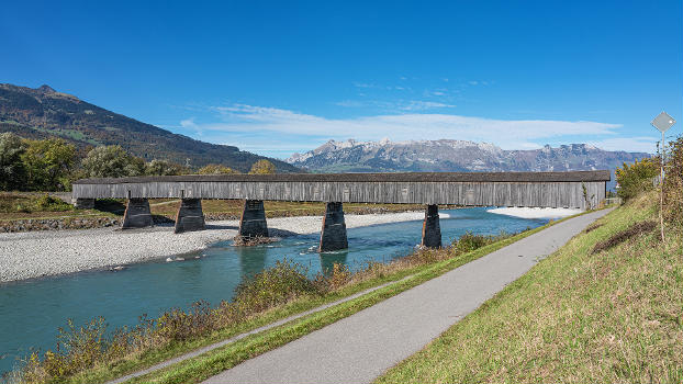 Old bridge to Switzerland over Alpine Rhine (view from Liechtenstein side) in Vaduz, Liechtenstein