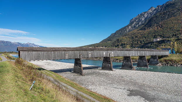 Old bridge to Switzerland over Alpine Rhine (view from Swiss side) in Vaduz, Liechtenstein