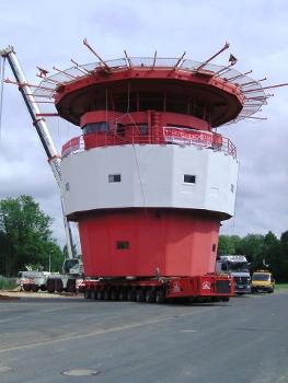 Grosser Vogelsand Lighthouse : The upper part of the former lighthouse Großer Vogelsand in the North Sea is being transported to the estate of havenhostel Bremerhaven, Germany