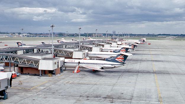 London Heathrow Airport Terminal 1 : A line-up of Hawker Siddeley Trident aircraft (G-ARPJ in the foreground) of British European Airways (BEA) at London Heathrow Airport Terminal 1 in 1971, over 40 years ago.