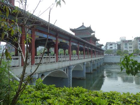 Longevity Bridge : The Longevity Bridge (or Changshou Bridge) in Mengshan County's county seat was originally known as the Xiguan Bridge. It was first built during the Ming Dynasty but rebuilt several times after being destroyed by floods. The current bridge dates from 1801.