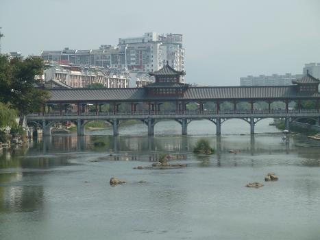 Longevity Bridge : The Longevity Bridge (or Changshou Bridge) in Mengshan County's county seat was originally known as the Xiguan Bridge. It was first built during the Ming Dynasty but rebuilt several times after being destroyed by floods. The current bridge dates from 1801.