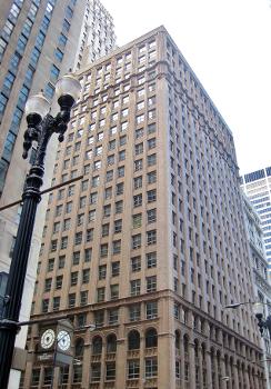 The Lumber Exchange Building and Tower Addition in Chicago (1925) : The original 16 stories were built in the Chicago style in 1915. A 35-story tower was added onto the building in 1925. The building was the longtime host of the Sidley &amp; Austin law firm.